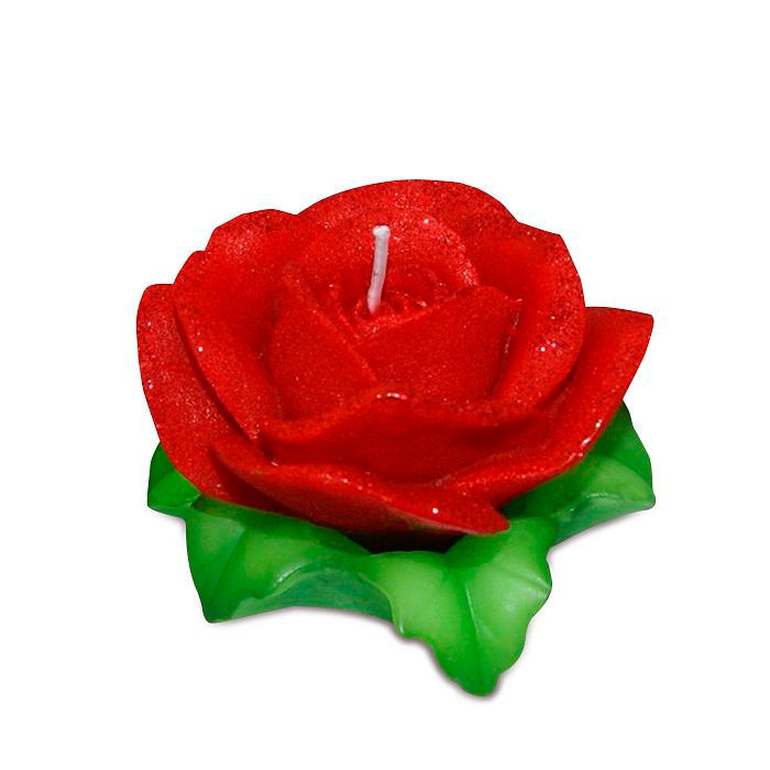 свеча роза красная на листьях