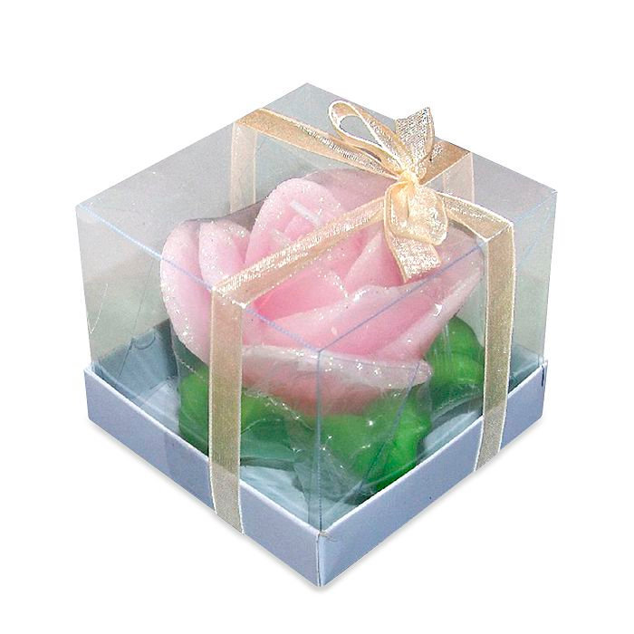 свеча роза розовая на листьях